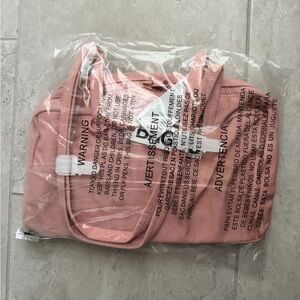 Sold out Urban Outfitters Exclusive BAGGU Rose Tan Bowler Bag